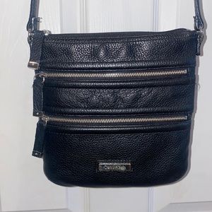 Authentic CALVIN KLEIN Crossbody Bag in black.